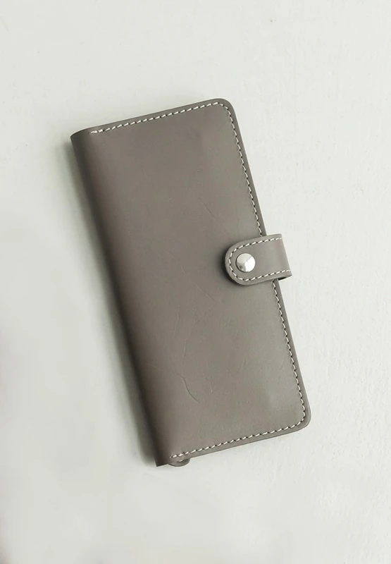 Шкіряне жіноче портмоне 7.0 темно-бежеву