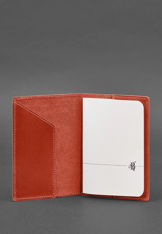 Шкіряна обкладинка для паспорта коралова з українським гербом